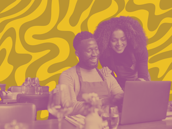 Stylized graphic of a couple working on their small business